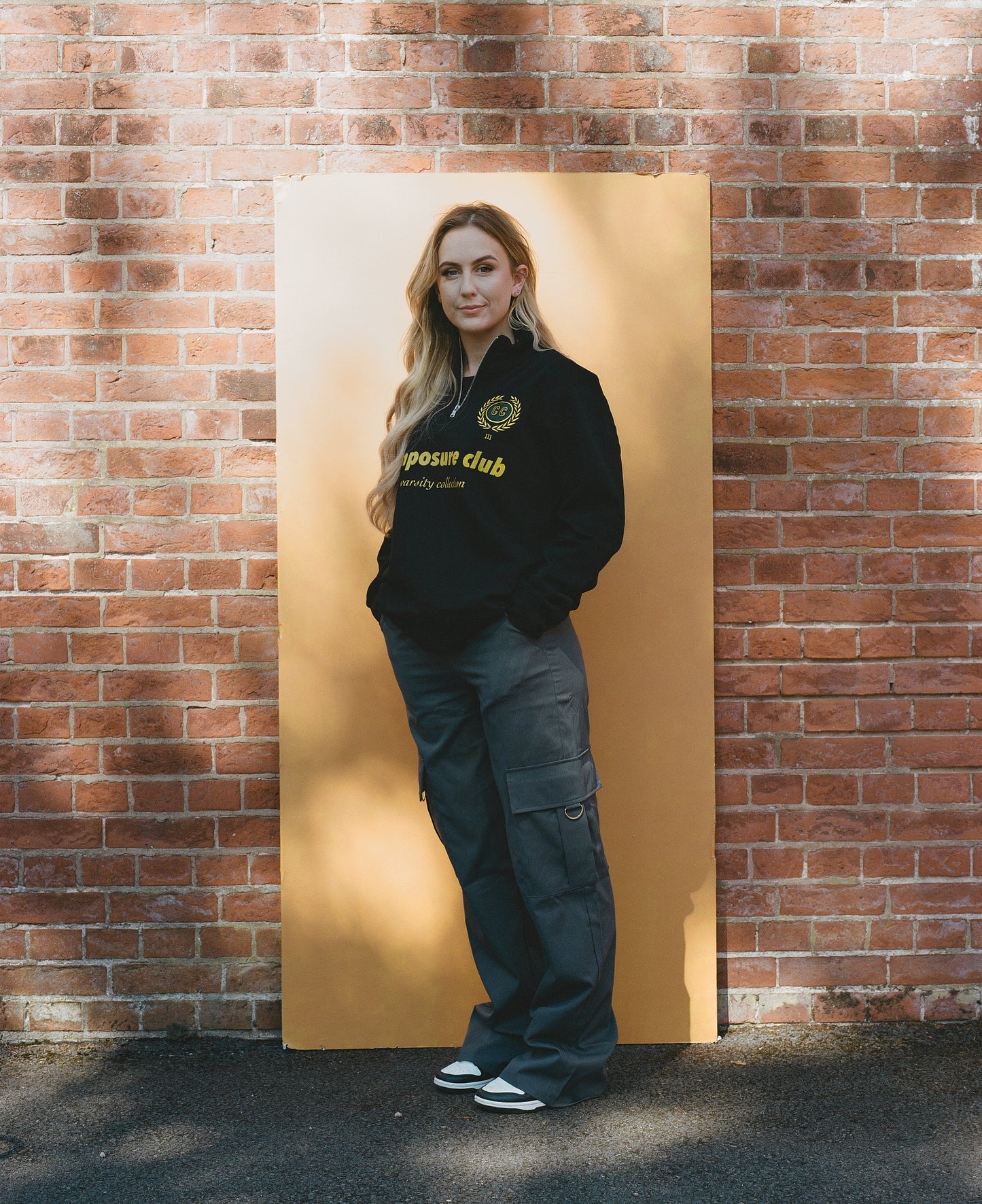 Maglione con zip a un quarto della collezione Varsity - nero