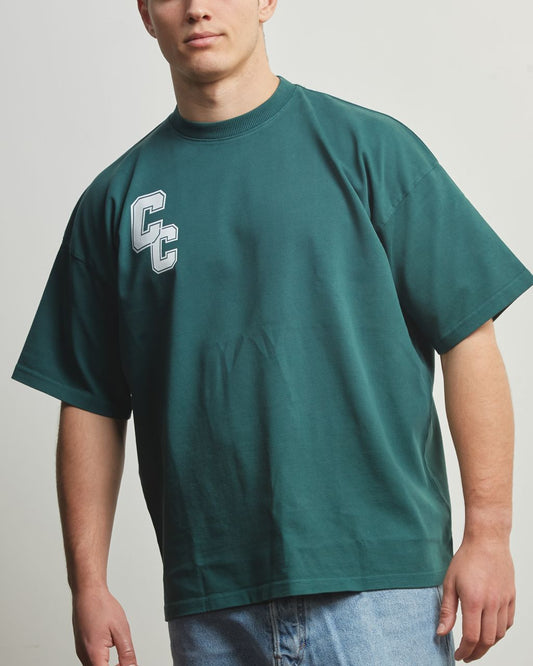 collective of composed individuals - green tee